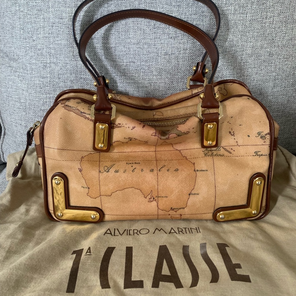 Geo print and leather handbag.